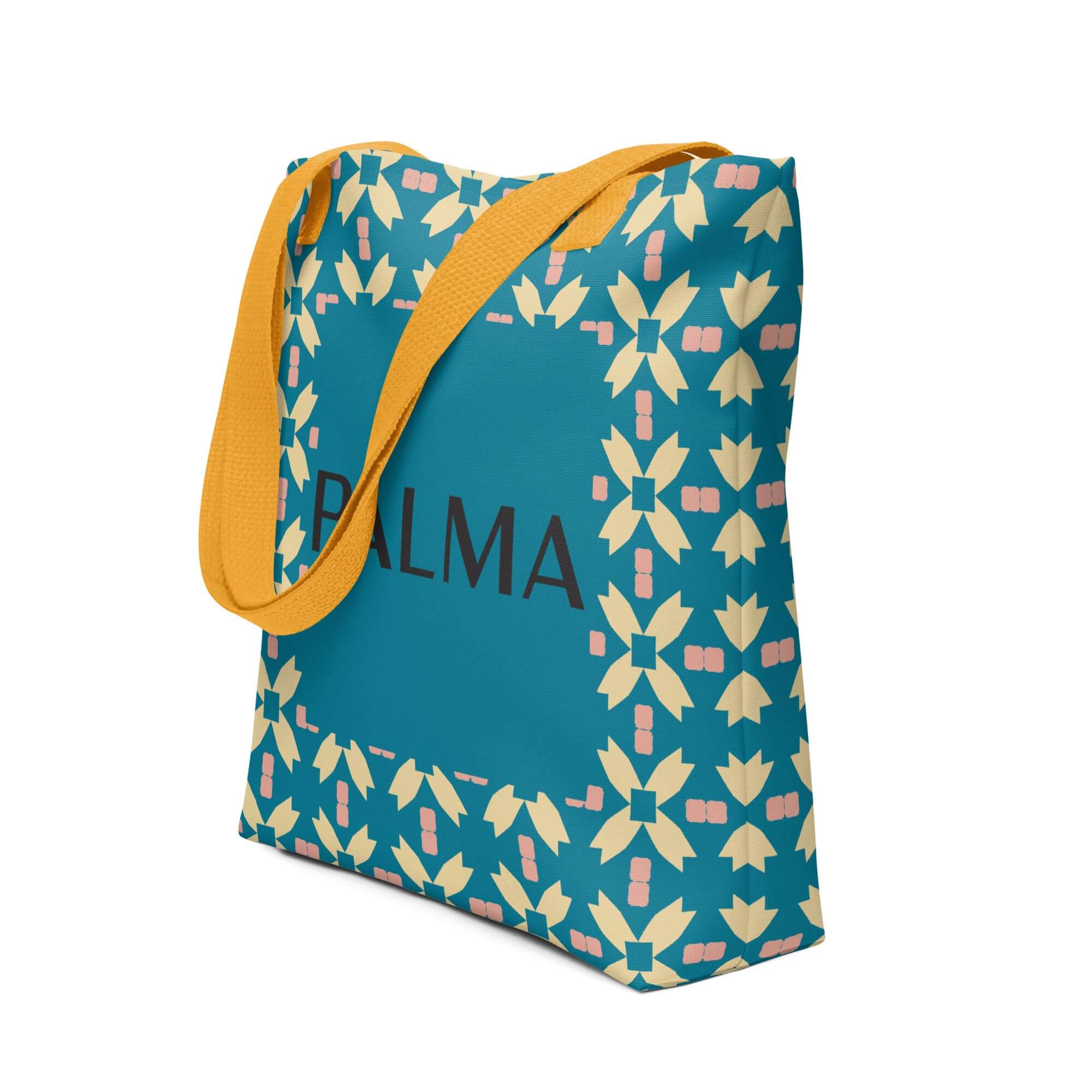 Side angle of PALMA tote bag featuring Teal Petal Grid pattern with yellow handles